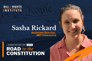 Portrait of Sasha Rickard, Assistant Director at MIT Concourse, with a backdrop of the Constitution.