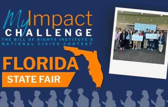 Group of people holding checks at the Florida State Fair for the MyImpact Challenge civics contest.