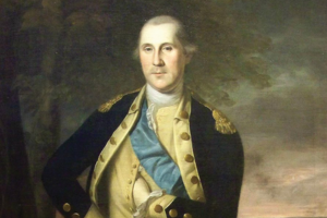 Portrait of a man in a military uniform with a white sash and blue collar, standing against a landscape background.